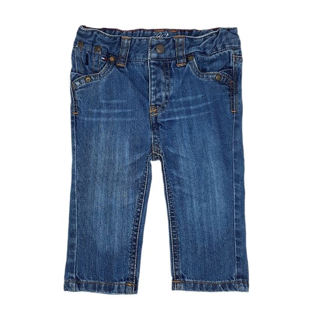 Jean mode bébé fille TOMMY HILFIGER d'occasion 6-9 mois en denim bleu délavé